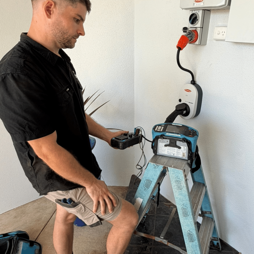 Electrician installing home EV charger Perth